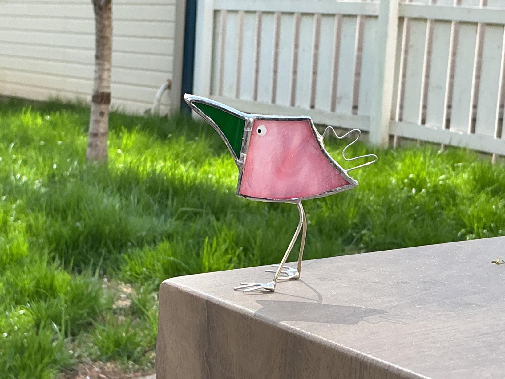 Pink and green silly bird