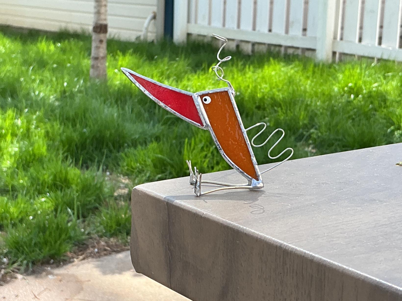 Orange and red silly bird