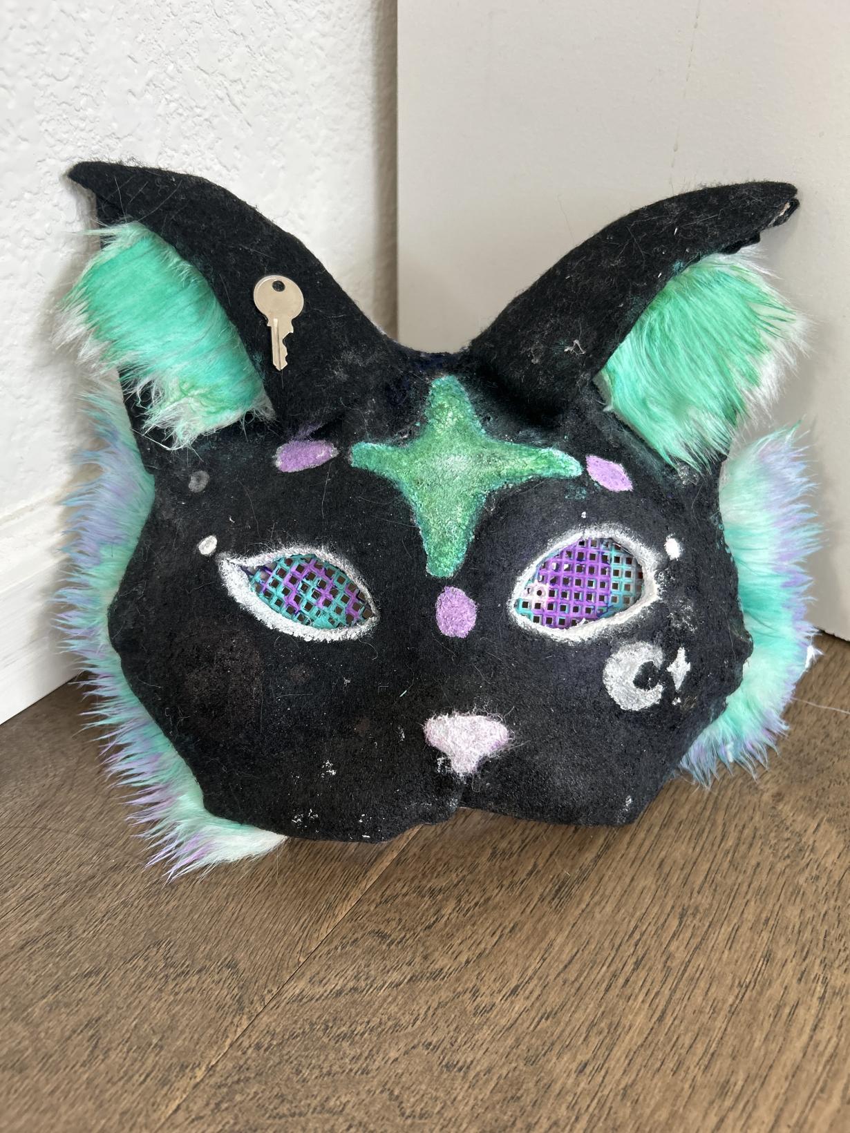 Green and purple cat therian mask