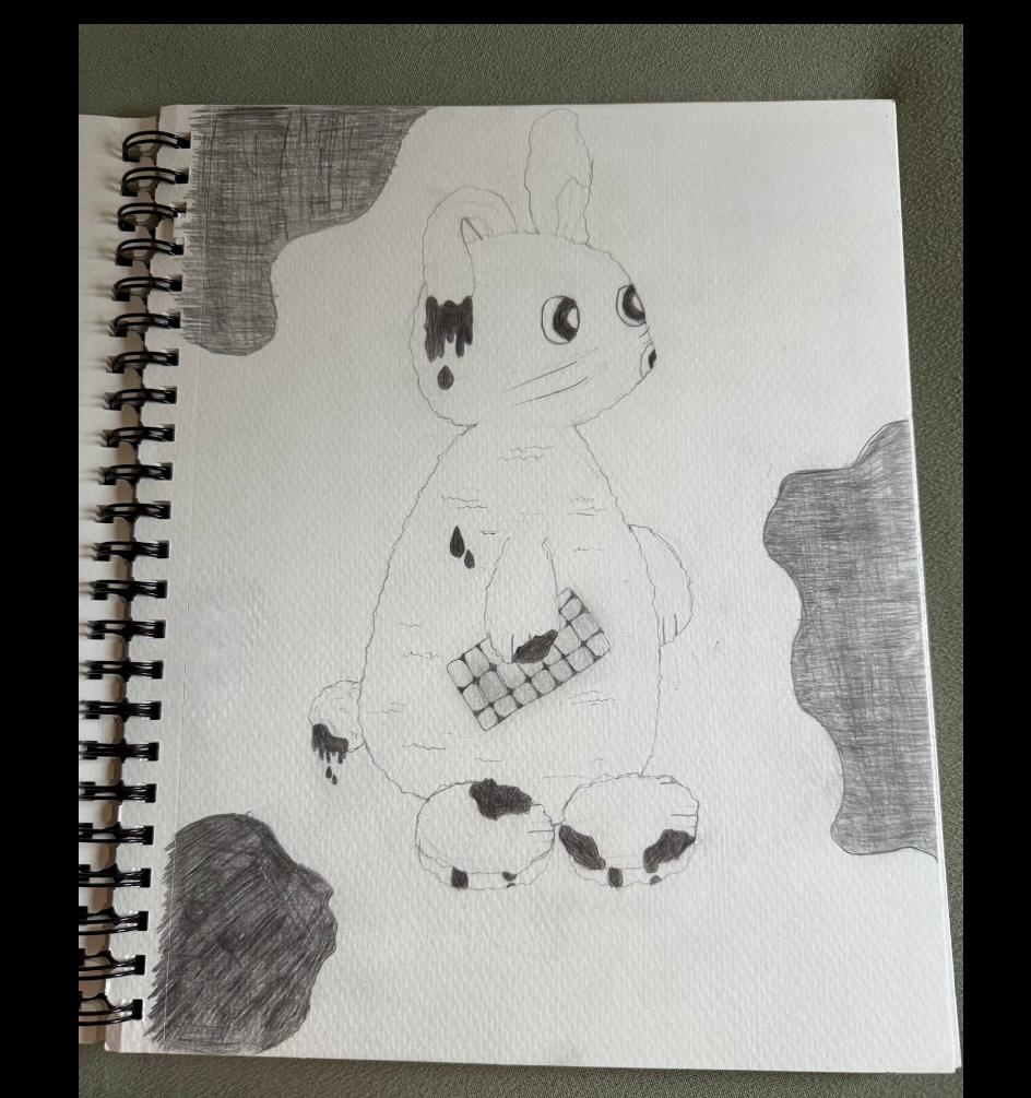 chocolate covered bunny with a chocolate bar